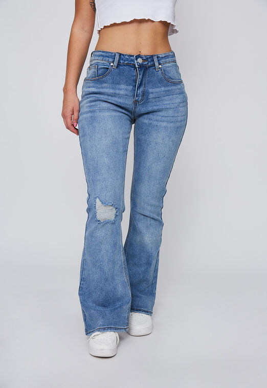 Jeans Flare Con Destroyed Celeste Sioux